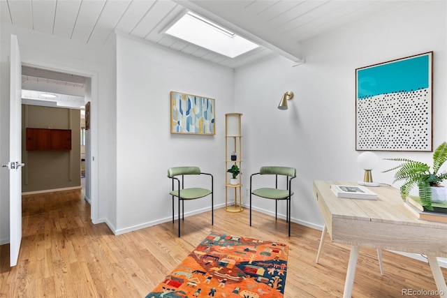 1338 S Fairfax St, Denver, CO 80222 - home office featuring a skylight, wood finished floors, and beamed ceiling