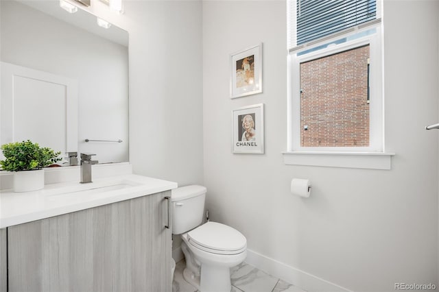2922 W 26th Ave Unit 1, Denver, CO 80211 - bathroom featuring vanity and marble look tiles