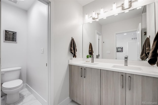2922 W 26th Ave Unit 1, Denver, CO 80211 - bathroom with double vanity and marble look tiles