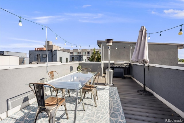 2922 W 26th Ave Unit 1, Denver, CO 80211 - deck featuring outdoor dining area and a grill