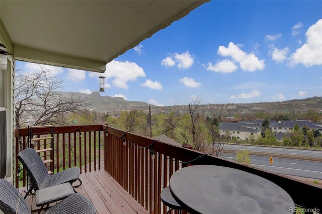 balcony featuring a mountain view