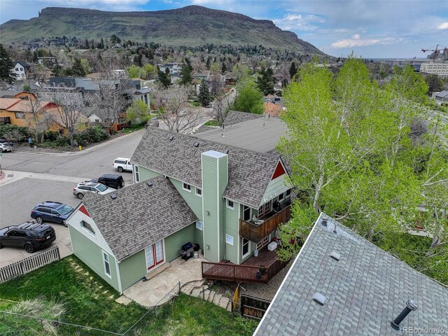 view of subject property with mountains