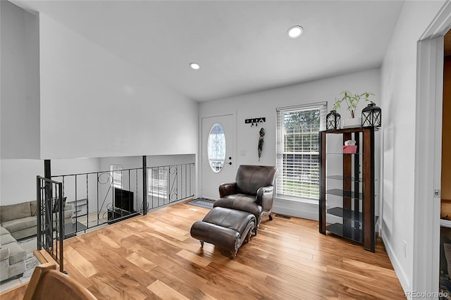 sitting room with light hardwood / wood-style flooring