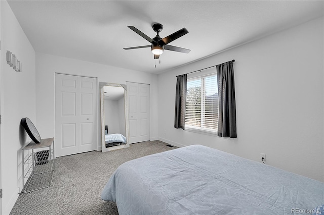 carpeted bedroom featuring ceiling fan