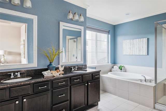 bathroom featuring tile patterned flooring, vanity, separate shower and tub, and ornamental molding