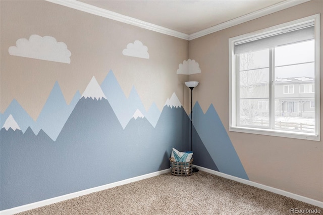 carpeted spare room with ornamental molding and a wealth of natural light