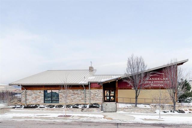 view of snow covered property