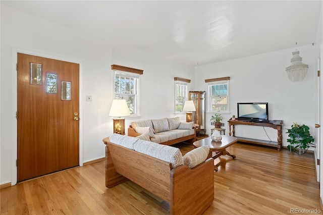 5960 Glencoe St, Commerce City, CO 80022 - living area featuring light wood-style flooring