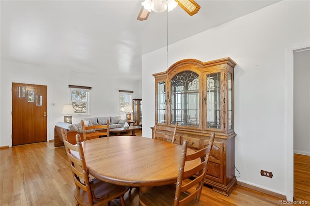 5960 Glencoe St, Commerce City, CO 80022 - dining space with light wood-type flooring, a ceiling fan, and baseboards