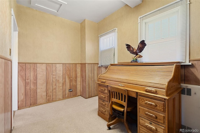 5960 Glencoe St, Commerce City, CO 80022 - home office featuring attic access, light carpet, and wooden walls