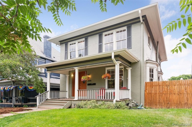 1352 N Downing St, Denver, CO 80218 - view of front facade with covered porch and brick siding