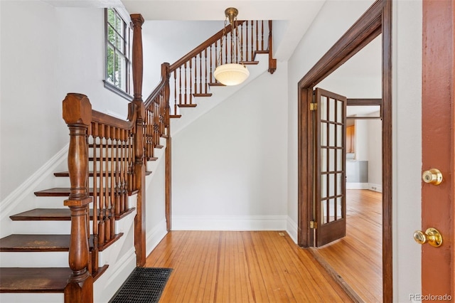 1352 N Downing St, Denver, CO 80218 - stairway with hardwood / wood-style floors