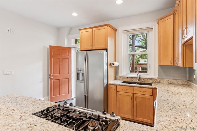 1352 N Downing St, Denver, CO 80218 - kitchen featuring stainless steel refrigerator with ice dispenser, range, light stone counters, plenty of natural light, and recessed lighting