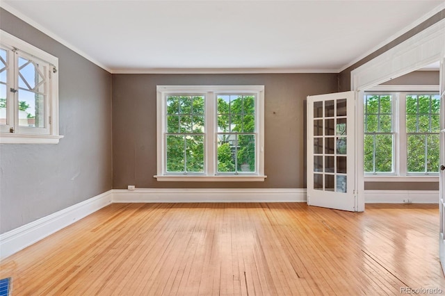 1352 N Downing St, Denver, CO 80218 - spare room featuring hardwood / wood-style flooring and ornamental molding