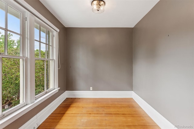 1352 N Downing St, Denver, CO 80218 - unfurnished room with baseboards and light wood finished floors