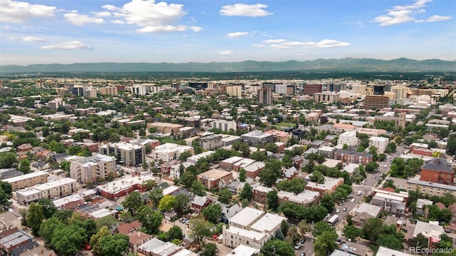 1352 N Downing St, Denver, CO 80218 - aerial view of property and surrounding area with a mountain backdrop and nearby urban area
