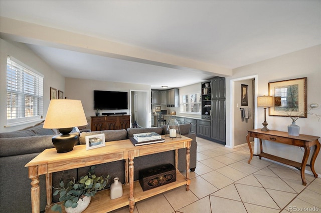 living room with light tile patterned floors