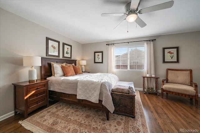 bedroom featuring ceiling fan and dark wood-type flooring