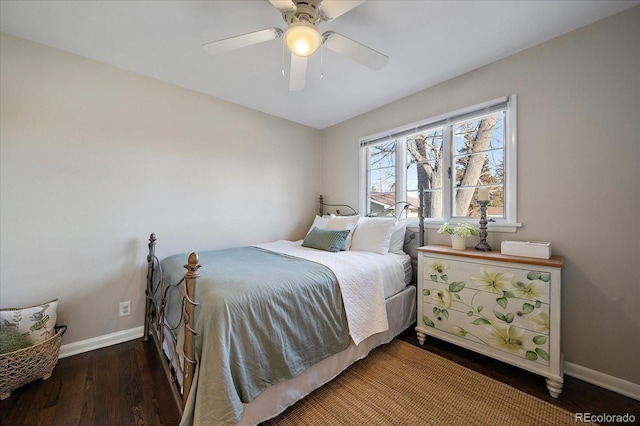 bedroom featuring ceiling fan and dark hardwood / wood-style floors