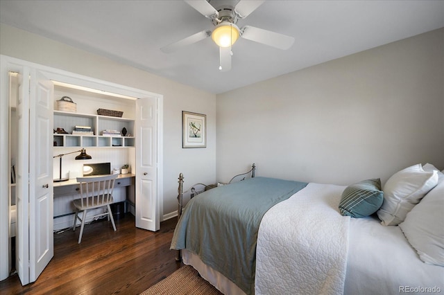 bedroom featuring ceiling fan and dark wood-type flooring