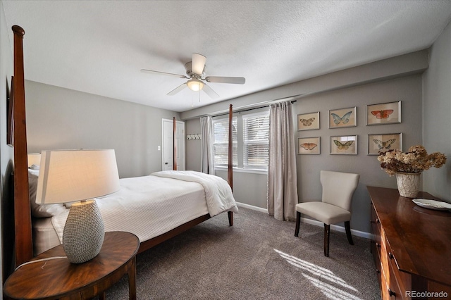 bedroom featuring ceiling fan, carpet flooring, and a textured ceiling