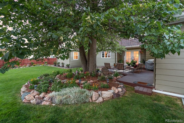 view of yard featuring a wooden deck