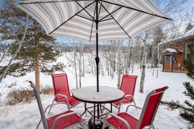 view of snow covered patio