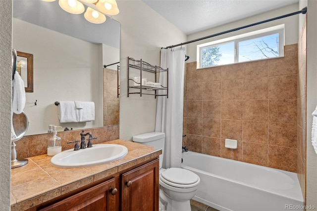 full bathroom with a textured ceiling, vanity, shower / tub combo, and toilet