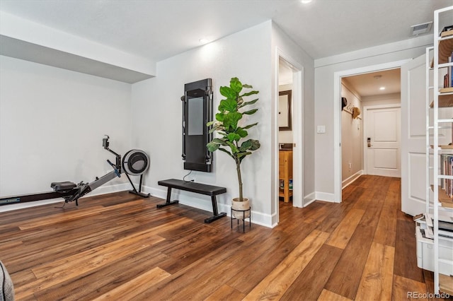 exercise room featuring hardwood / wood-style flooring