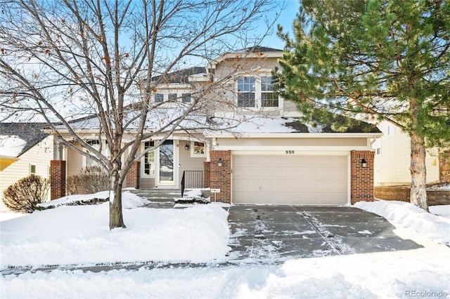 view of front of property with a garage