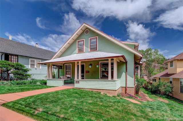 114 Cave Ave, Manitou Springs, CO 80829 - victorian-style house with a porch and a front yard