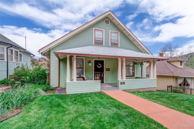 114 Cave Ave, Manitou Springs, CO 80829 - view of front of property with covered porch and a front yard