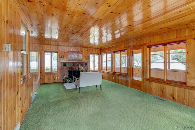 114 Cave Ave, Manitou Springs, CO 80829 - carpeted office featuring wooden walls, a fireplace, and wood ceiling