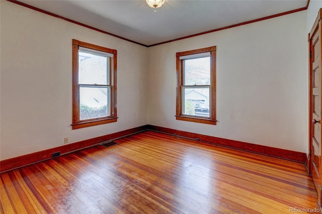 114 Cave Ave, Manitou Springs, CO 80829 - unfurnished room featuring hardwood / wood-style floors, baseboards, and ornamental molding