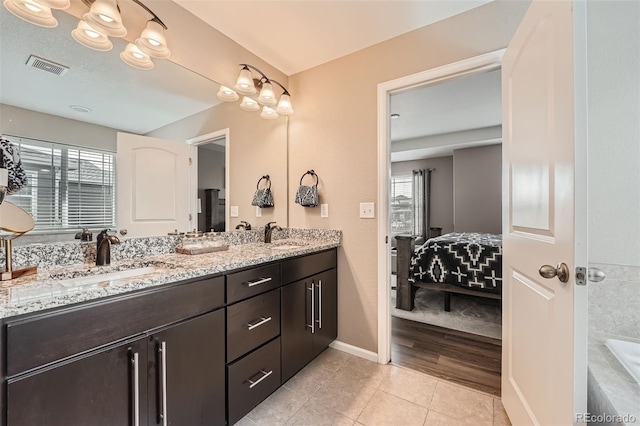 26731 E Hinsdale Pl, Aurora, CO 80016 - full bathroom with a sink, tile patterned flooring, plenty of natural light, and visible vents