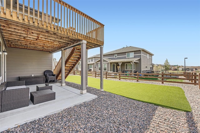 26731 E Hinsdale Pl, Aurora, CO 80016 - view of yard featuring stairway, a patio, a fenced backyard, and a deck