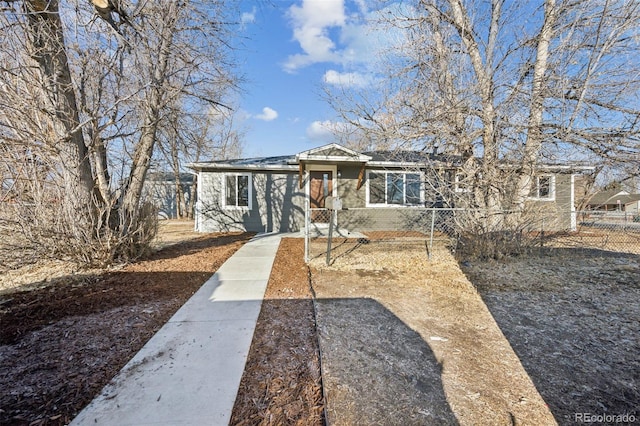 view of front of home with fence