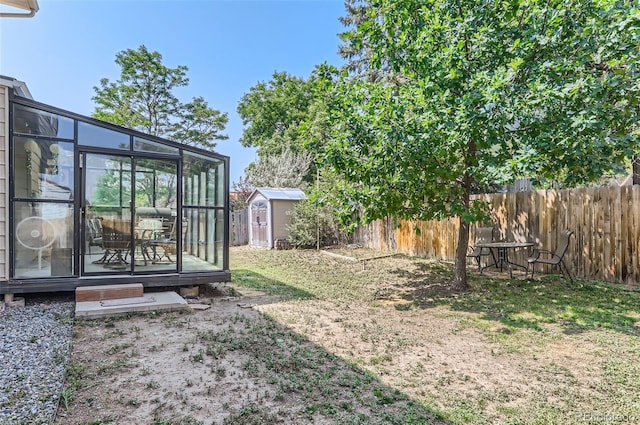 view of yard featuring a storage shed