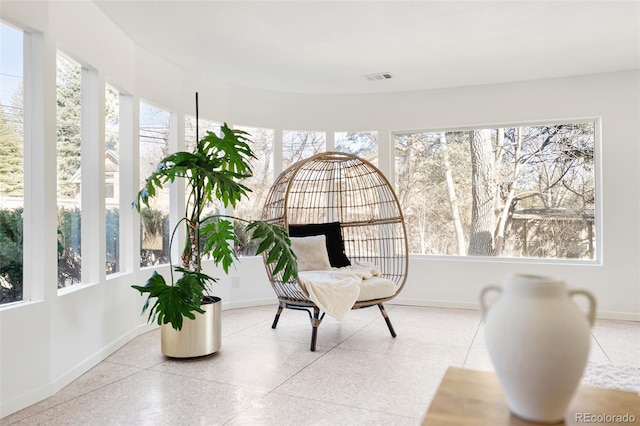 sunroom featuring visible vents