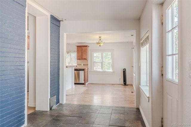 4368 Benton St, Denver, CO 80212 - corridor with a chandelier and stone finish flooring