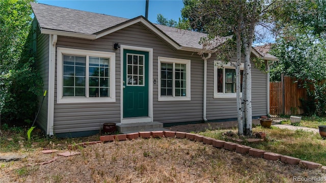 4368 Benton St, Denver, CO 80212 - view of front of house with entry steps and a shingled roof