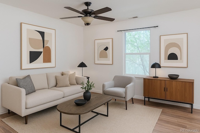 4368 Benton St, Denver, CO 80212 - living area featuring light wood-style floors and ceiling fan
