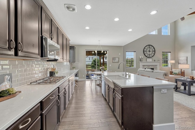 6738 Esmeralda Dr, Castle Rock, CO 80108 - kitchen featuring a sink, appliances with stainless steel finishes, healthy amount of natural light, light wood-style floors, and recessed lighting