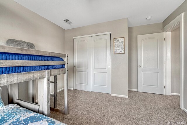 6738 Esmeralda Dr, Castle Rock, CO 80108 - carpeted bedroom with baseboards and a closet