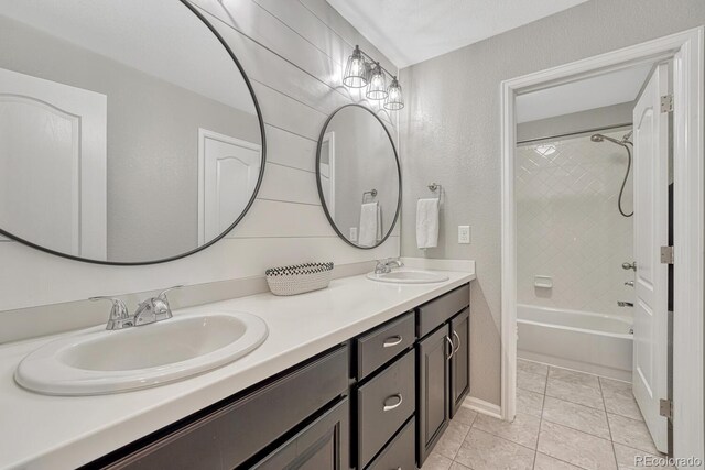 6738 Esmeralda Dr, Castle Rock, CO 80108 - full bathroom with double vanity,  shower combination, tile patterned flooring, and baseboards