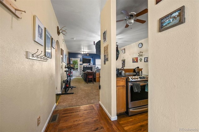 5720 County Road 64 # A102, Bailey, CO 80421 - corridor featuring a textured wall and dark wood finished floors