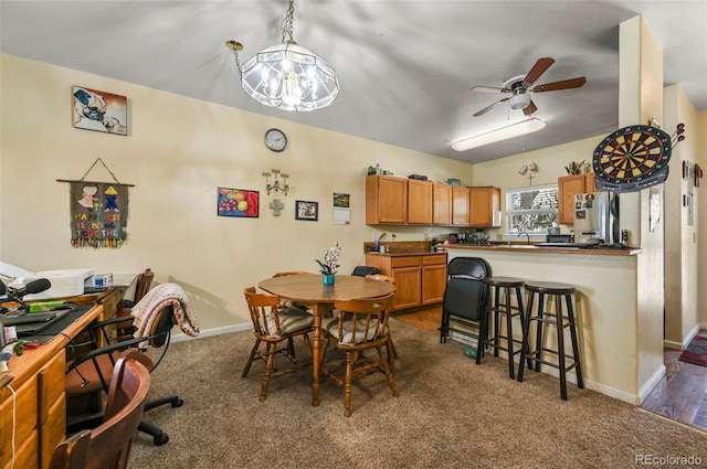 5720 County Road 64 # A102, Bailey, CO 80421 - dining room featuring a ceiling fan and dark colored carpet
