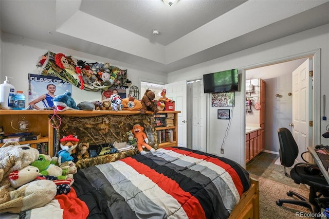 5720 County Road 64 # A102, Bailey, CO 80421 - bedroom with a tray ceiling and ensuite bathroom