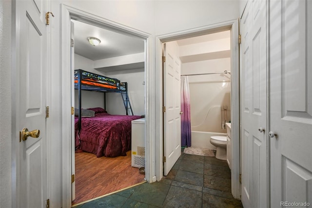 5720 County Road 64 # A102, Bailey, CO 80421 - full bath with shower / bath combo, stone tile flooring, and a closet