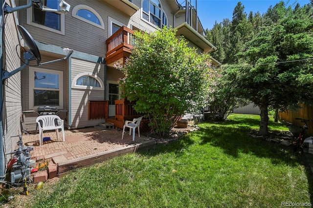 5720 County Road 64 # A102, Bailey, CO 80421 - view of yard featuring a balcony and a patio area